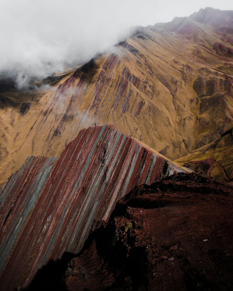 pexels-photo-19988408-19988408 A breathtaking aerial shot of Peru's Rainbow Mountain with vibrant mineral layers.
