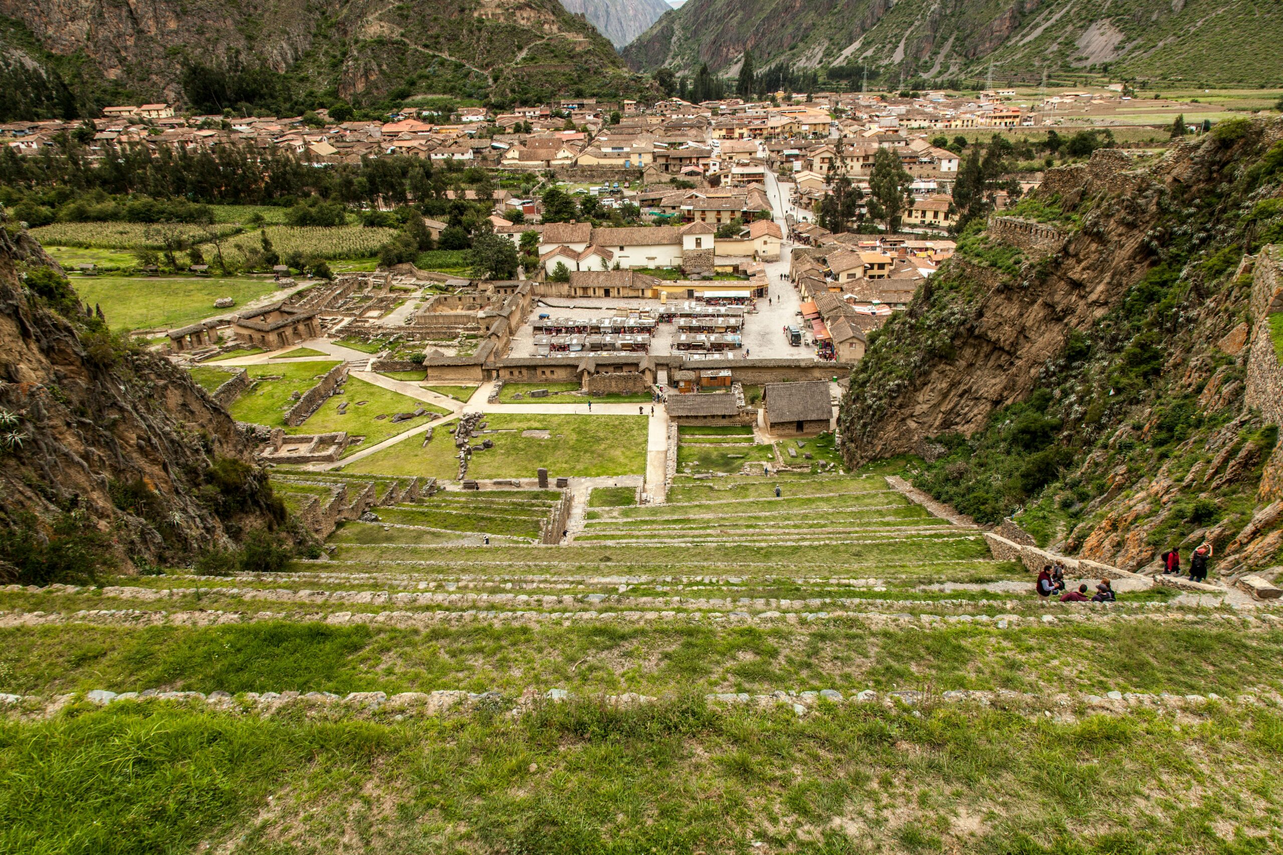View from Ollantaytambo ruins in Peru, showcasing the Sacred Valley's rich history and landscape.